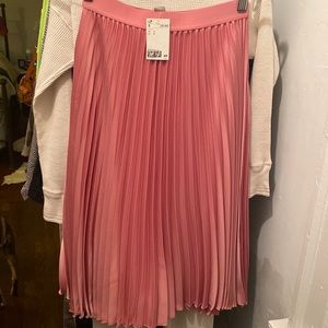 Pink pleated midi skirt